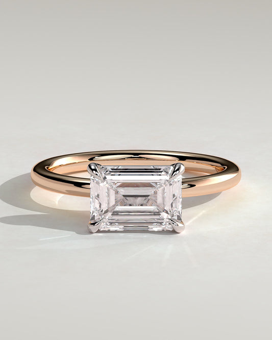 Debbie - Emerald East West Claw Solitaire Engagement Ring - Rose Two-Tone
