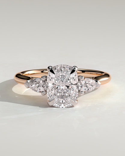 Cataleya - Elongated Cushion Claw Trilogy with Pear Side Stones and Cathedral Setting Engagement Ring - Rose Two-Tone
