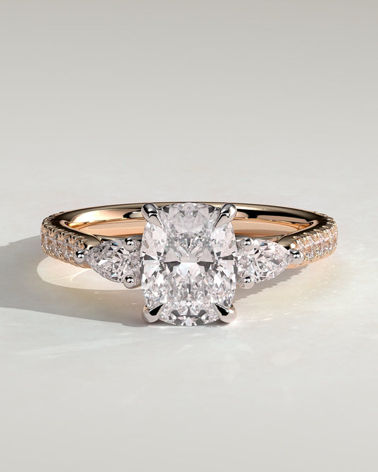 Bree - Elongated Cushion Claw Trilogy with Pear Side Stones and Pave Band Engagement Ring - Rose Two-Tone