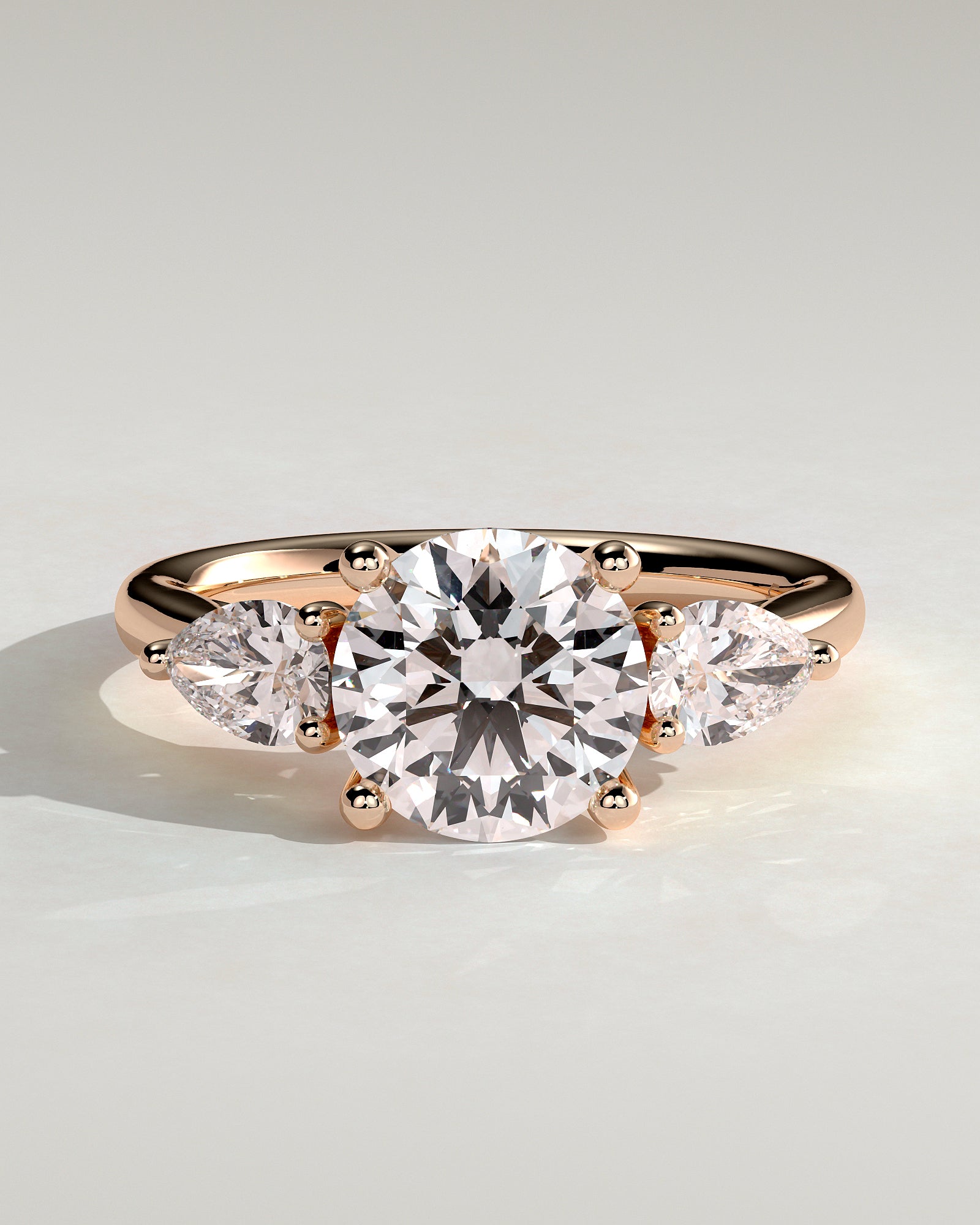 Adelyn - Round Claw Trilogy with Pear Side Stones and Open Trellis Gallery Engagement Ring - Rose Gold - Rose Gold 2ct
