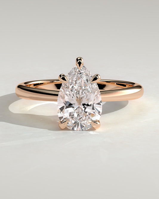 Aspen - Pear Claw Solitaire with Pinched Tapered Band and Cathedral Low Setting Engagement Ring - Rose Gold