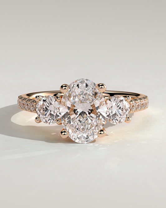 Aviana - Oval Claw Trilogy with Round Side Stones, Pave Band and Trellis Gallery  Engagement Ring - Rose Gold