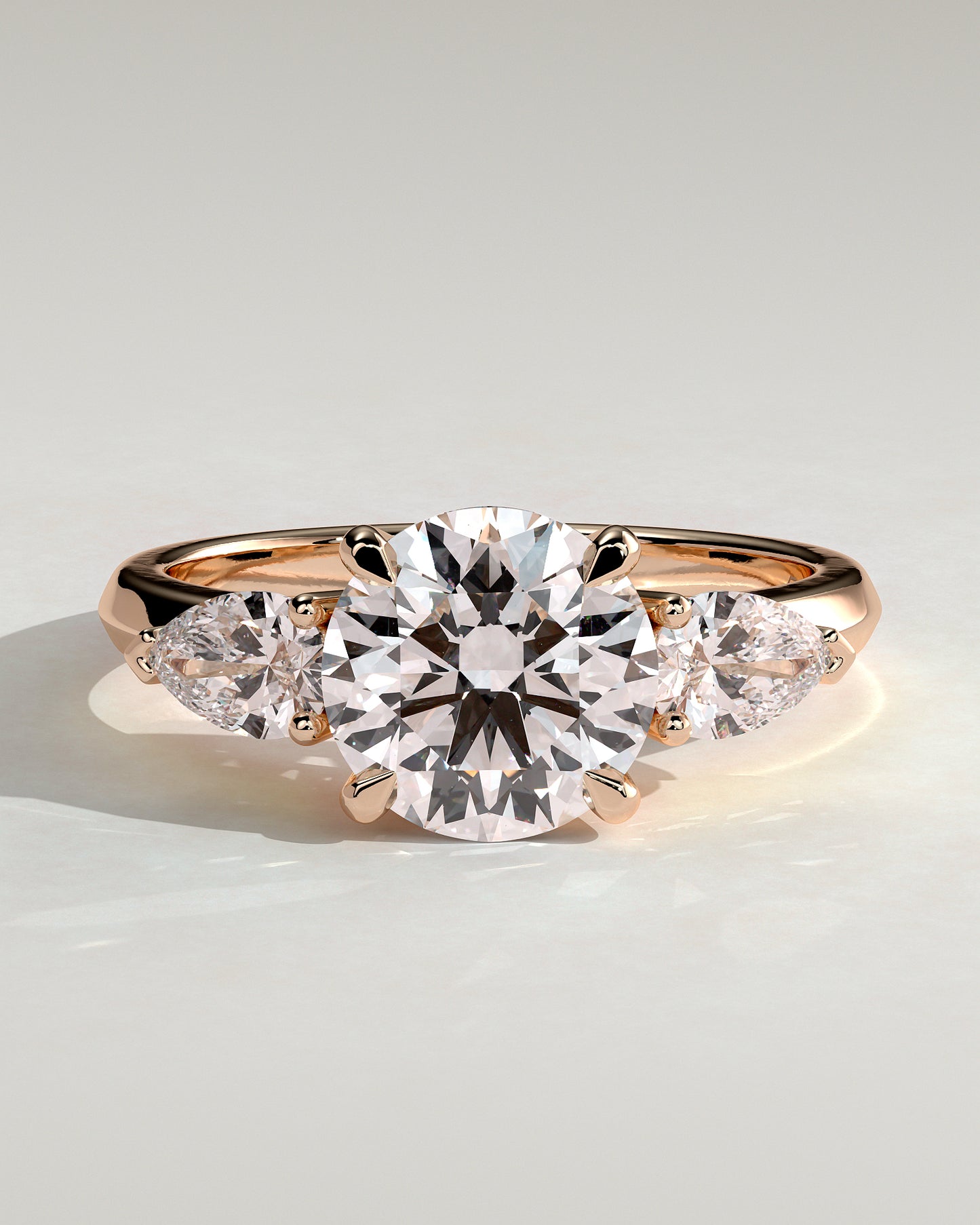 Halle - Round Claw Trilogy with Pear Side Stones and Knife Edge Band Engagement Ring - Rose Gold - Rose Gold 2ct