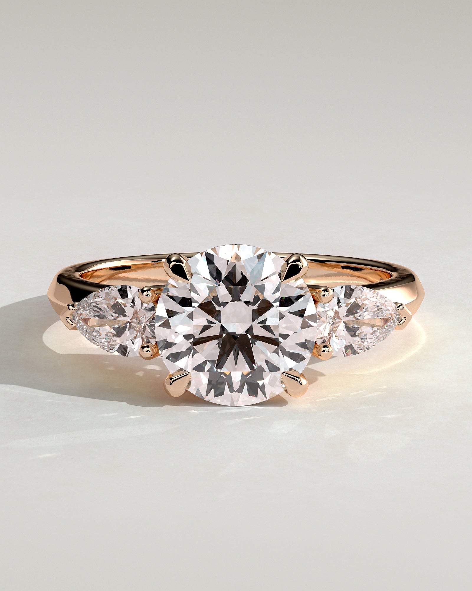 Halle - Round Claw Trilogy with Pear Side Stones and Knife Edge Band Engagement Ring - Rose Gold - Rose Gold 2ct