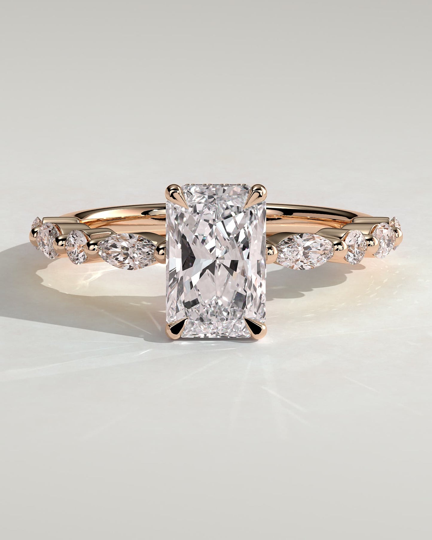 Kyla - Radiant Claw Solitaire with Marquise-Round Accent Stones and Wrap Around Hidden Halo Engagement Ring - Rose Gold