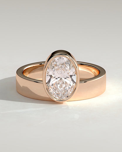 Carmen - Oval Bezel Solitaire with Offset Setting and Flat Cigar Band Engagement Ring - Rose Gold