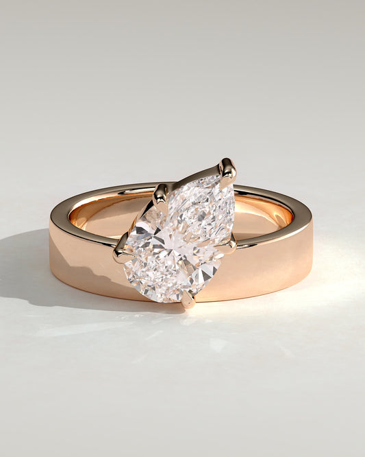 Tatiana - Pear Claw Solitaire with Offset Angled Setting and Flat Cigar Band Engagement Ring - Rose Gold