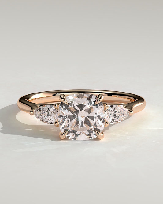 Selena - Cushion Claw Trilogy with Pear Side Stones and Open Trellis Gallery Engagement Ring - Rose Gold