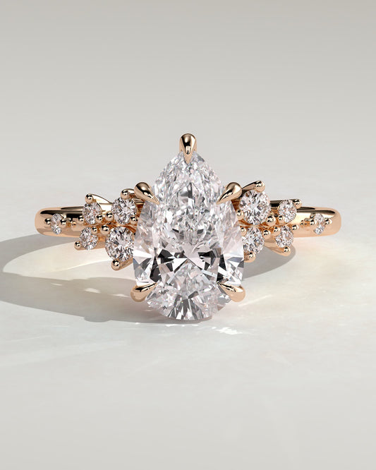 Polly - Pear Claw Solitaire with Clustered Round Shoulder Stones Engagement Ring - Rose Gold