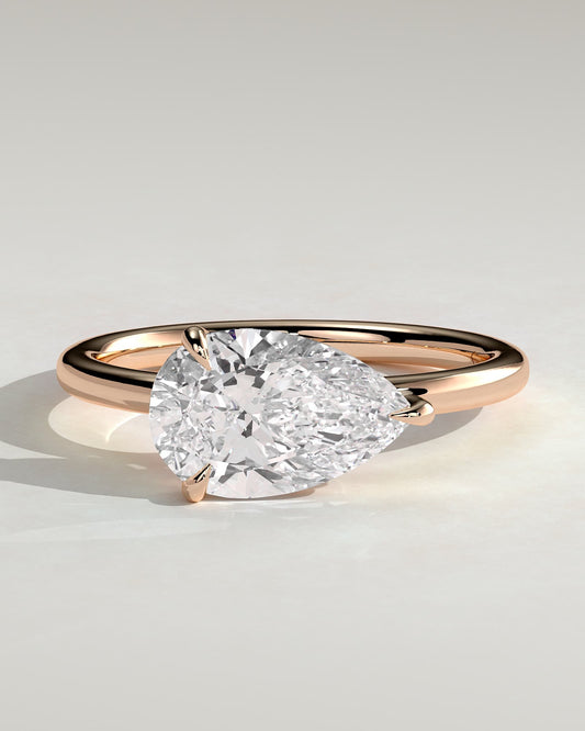 Suki - Pear East West Claw Solitaire with Raised Basket Gallery Engagement Ring - Rose Gold
