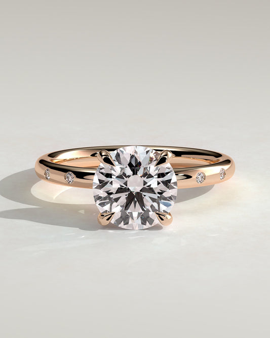 Nekija - Round Claw Solitaire with Inset Round Accent Stones Engagement Ring - Rose Gold