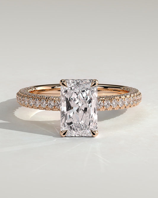 Irene - Radiant Claw Solitaire with Hidden Halo and Triple Pave Band Engagement Ring - Rose Gold