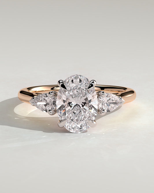 Alexia - Oval Claw Trilogy with Pear Side Stones and Cathedral Setting Engagement Ring - Rose Two-Tone - rose two-tone - Lara Jewels