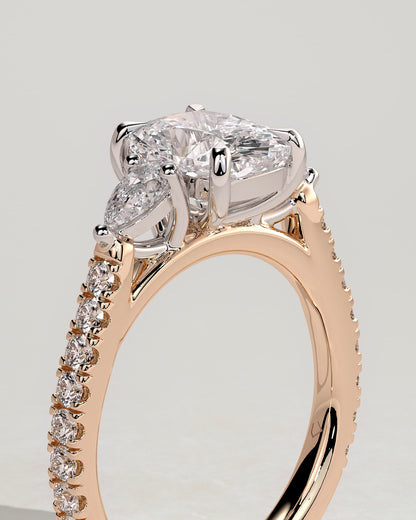 Bree - Elongated Cushion Claw Trilogy with Pear Side Stones and Pave Band Engagement Ring - Rose Two-Tone