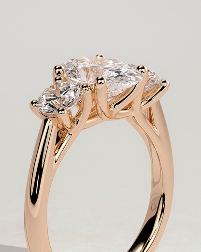 Grace - Oval Claw Trilogy with Round Side Stones, Open Trellis Gallery and Tapered Band Engagement Ring - Rose Gold