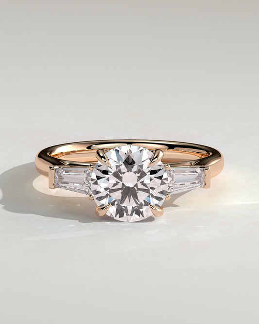 Marina - Round Claw Trilogy with Tapered Baguette Side Stones and Cathedral Setting Engagement Ring - Rose Gold