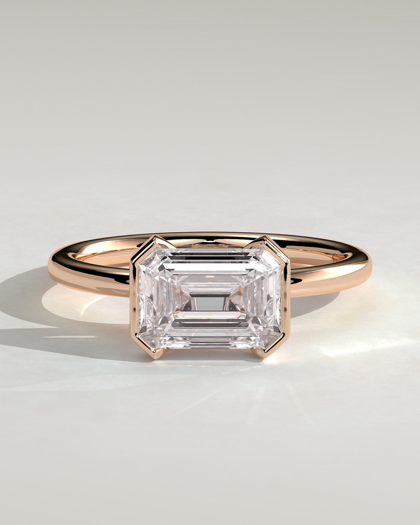 Jodie - Emerald East West Half Bezel Solitaire Engagement Ring - Rose Gold