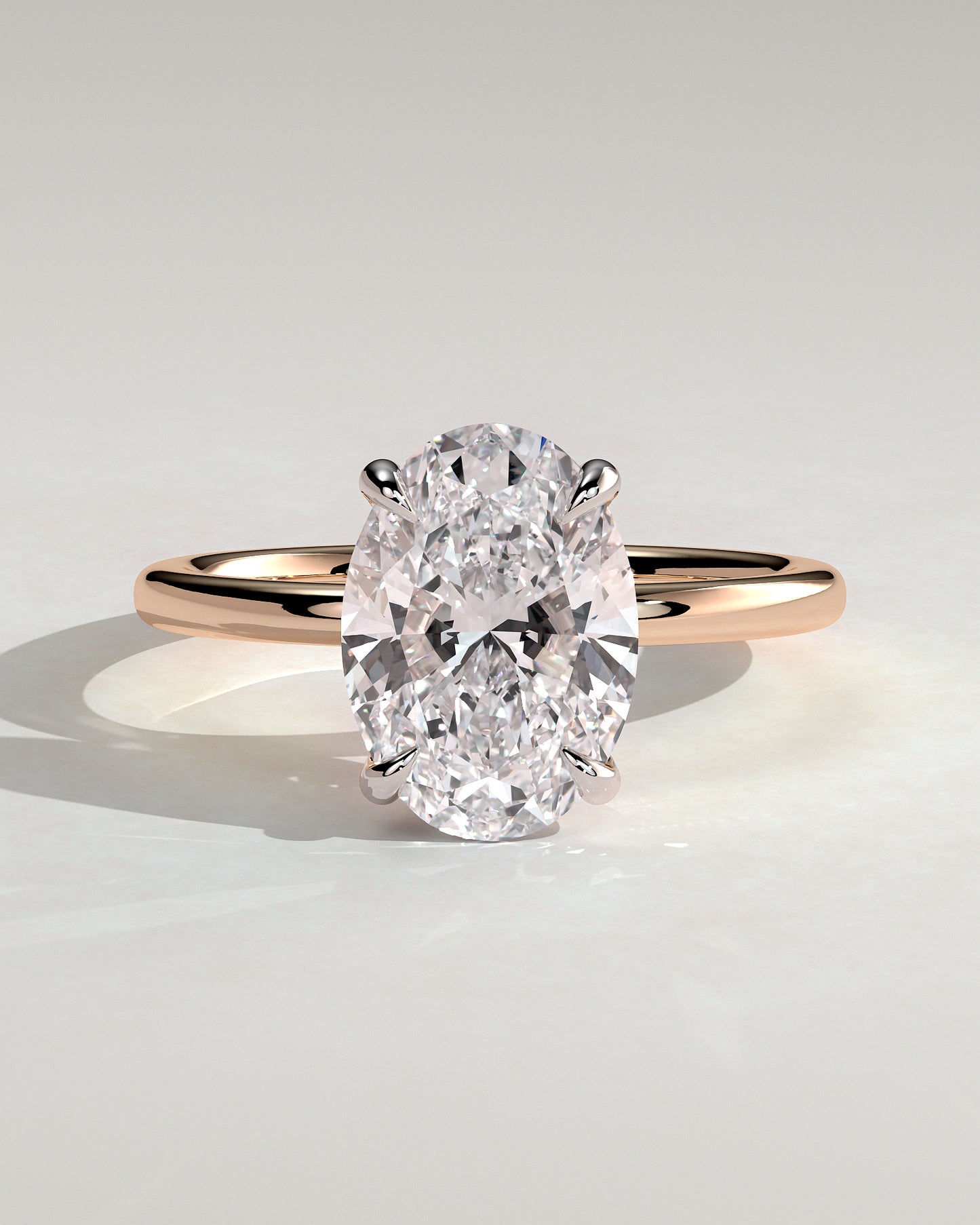 Daisy - Classic Oval Claw Solitaire Engagement Ring - Rose Two-Tone