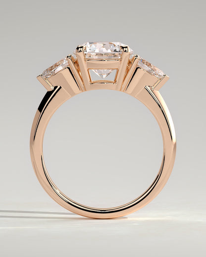 Halle - Round Claw Trilogy with Pear Side Stones and Knife Edge Band Engagement Ring - Rose Gold