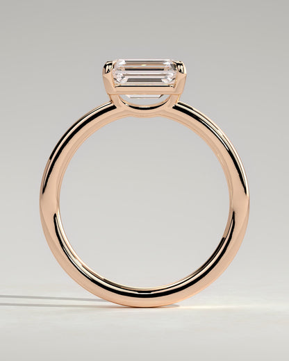 Evelyn - Emerald East West Claw Solitaire with Raised Basket Gallery Engagement Ring - Rose Gold