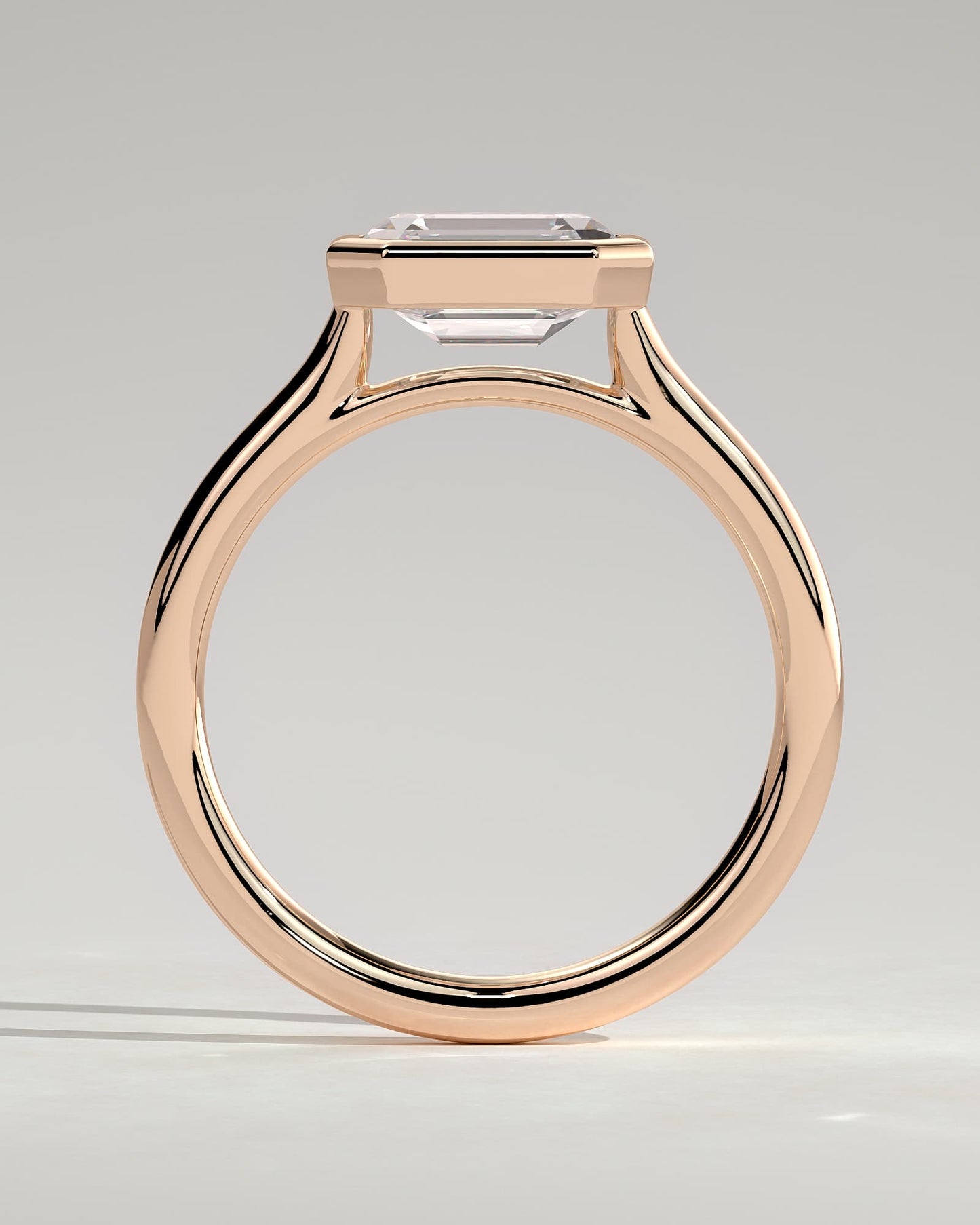 Olive - Statement Emerald East West Bezel Solitaire with Open Cathedral High Setting Engagement Ring - Rose Gold