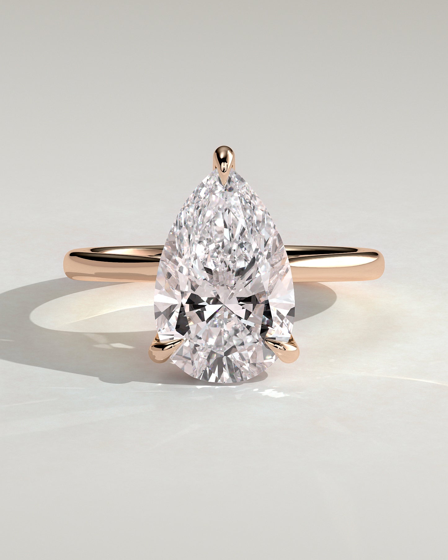 Courtney - Pear Claw Solitaire with Hidden Halo, Tapered Band and Cathedral High Setting Engagement Ring - Rose Gold