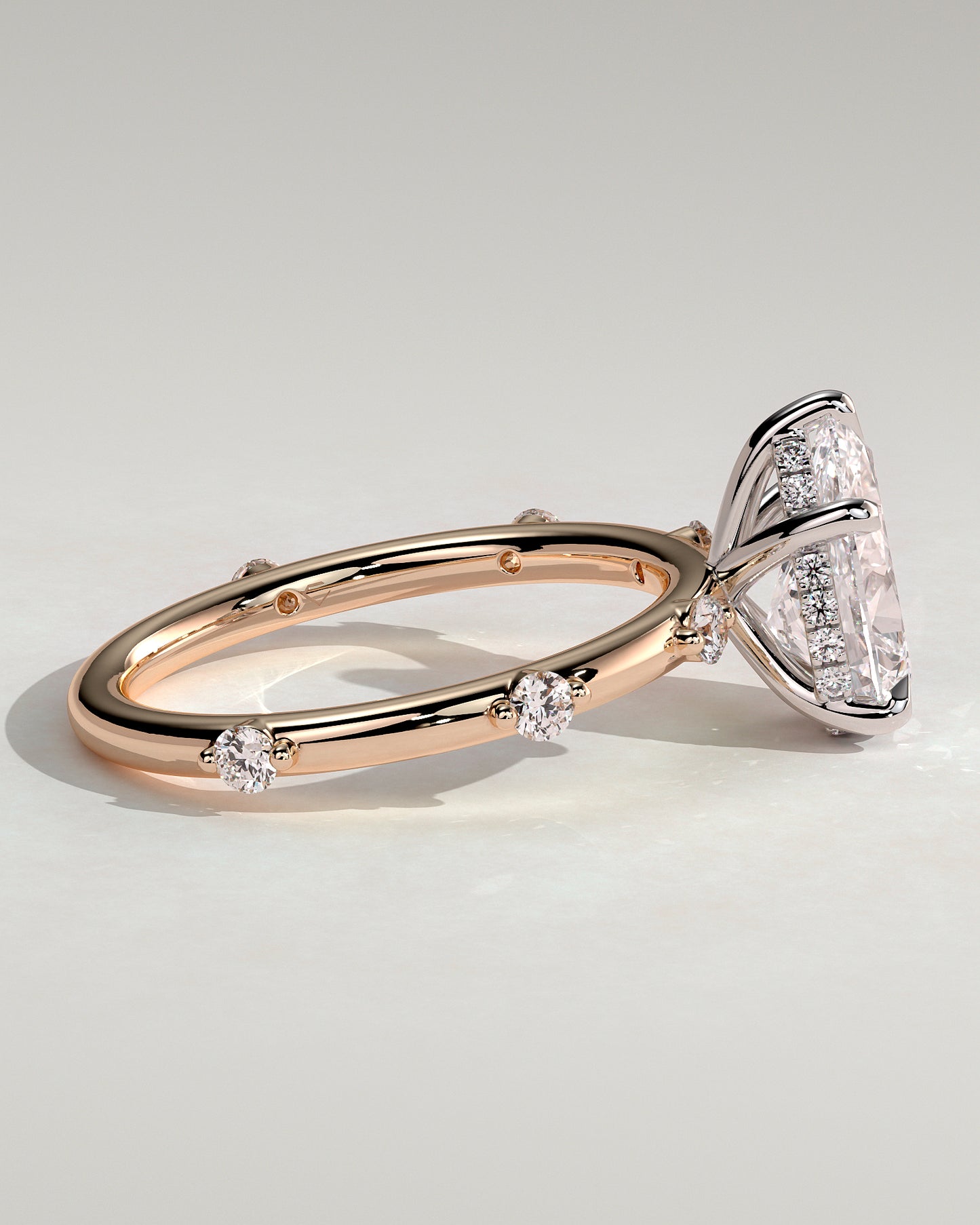 Amora - Pear Claw Solitaire with 6 Spaced Round Accent Stones and Hidden Halo Engagement Ring - Rose Two-Tone - Rose Two-Tone 2ct