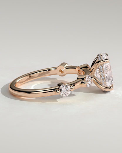Arwen - Oval Claw Solitaire with 4 Spaced Round Accent Stones and Hidden Halo Engagement Ring - Rose Gold