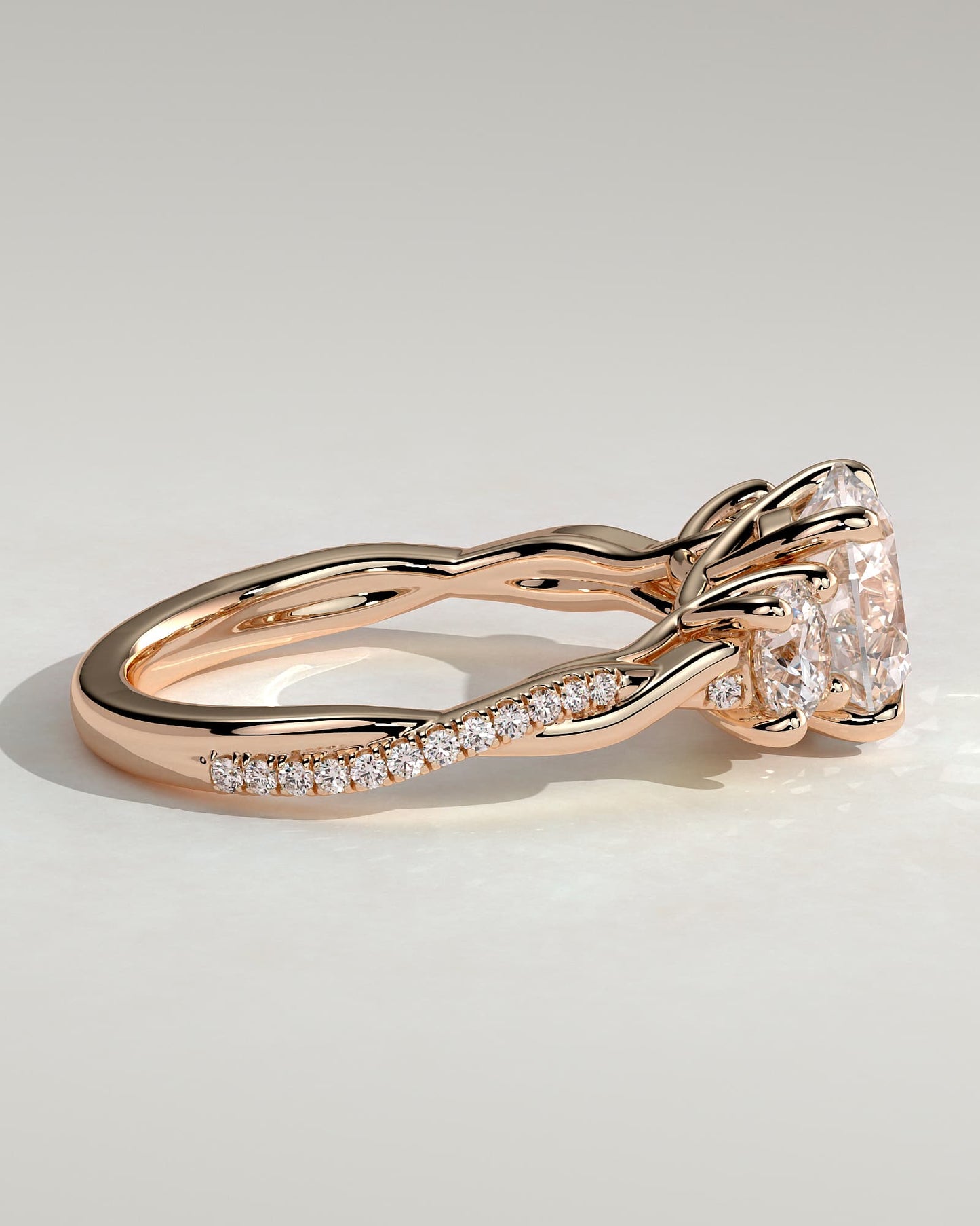 Jaylene - Round Claw Trilogy with Round Side Stones, Twisted Pave Band and Trellis Gallery Engagement Ring - Rose Gold