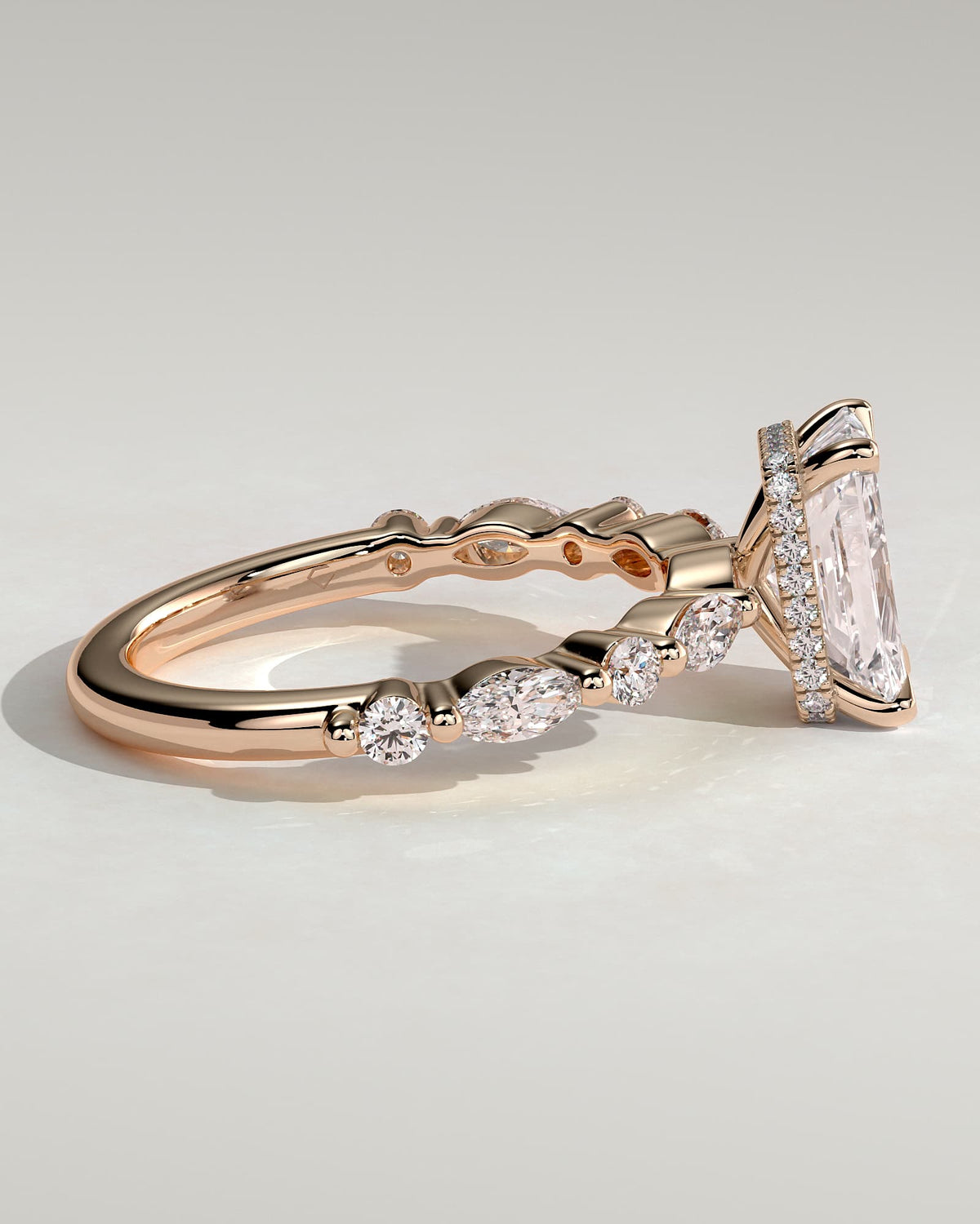 Kyla - Radiant Claw Solitaire with Marquise-Round Accent Stones and Wrap Around Hidden Halo Engagement Ring - Rose Gold