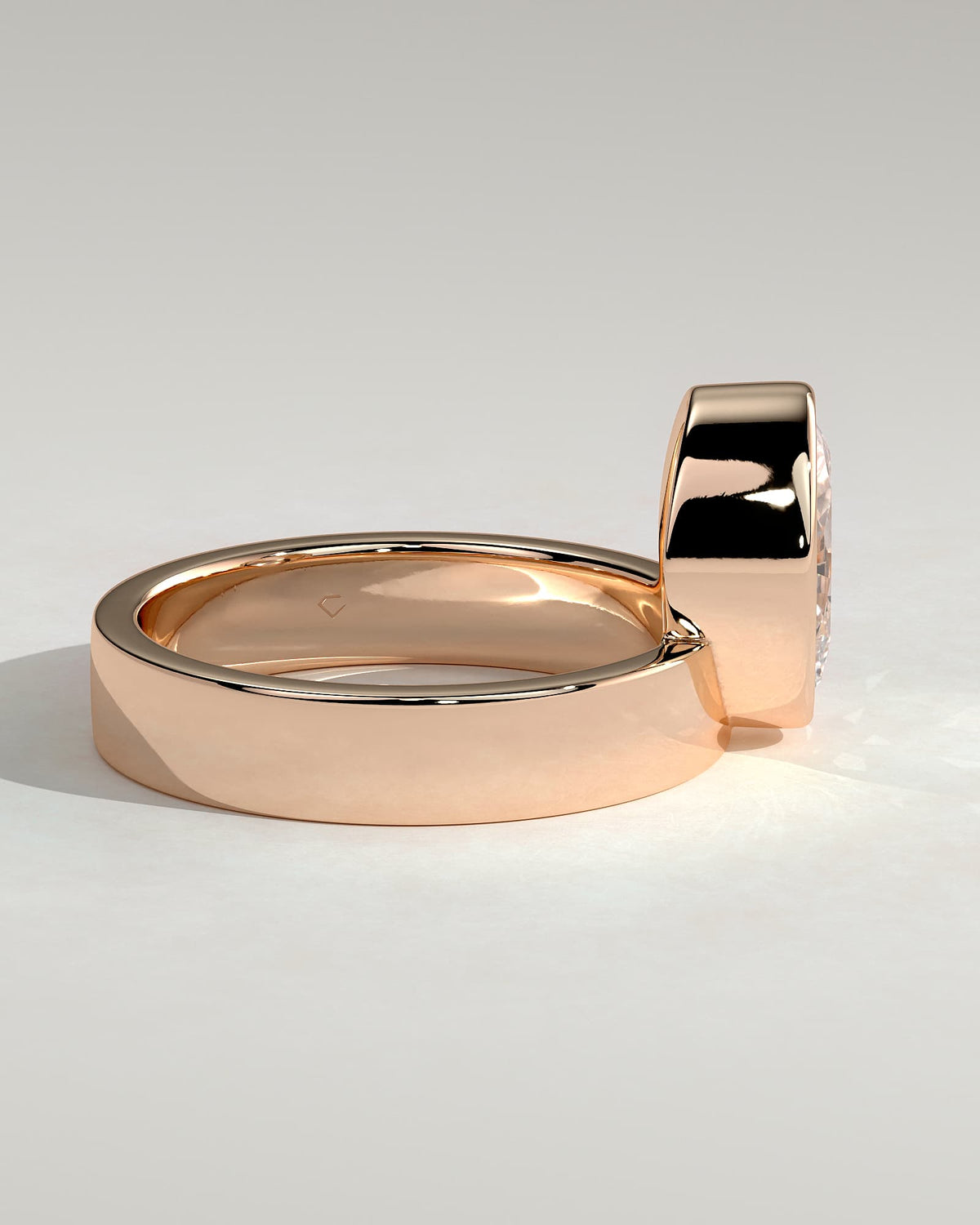 Carmen - Oval Bezel Solitaire with Offset Setting and Flat Cigar Band Engagement Ring - Rose Gold