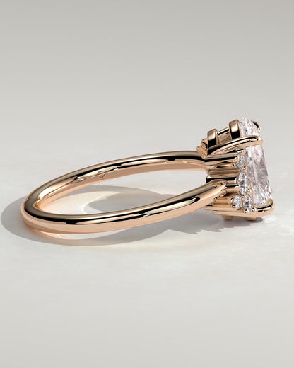 Esther - Oval Claw Solitaire with Clustered Round Opposing Shoulder Stones Engagement Ring - Rose Gold