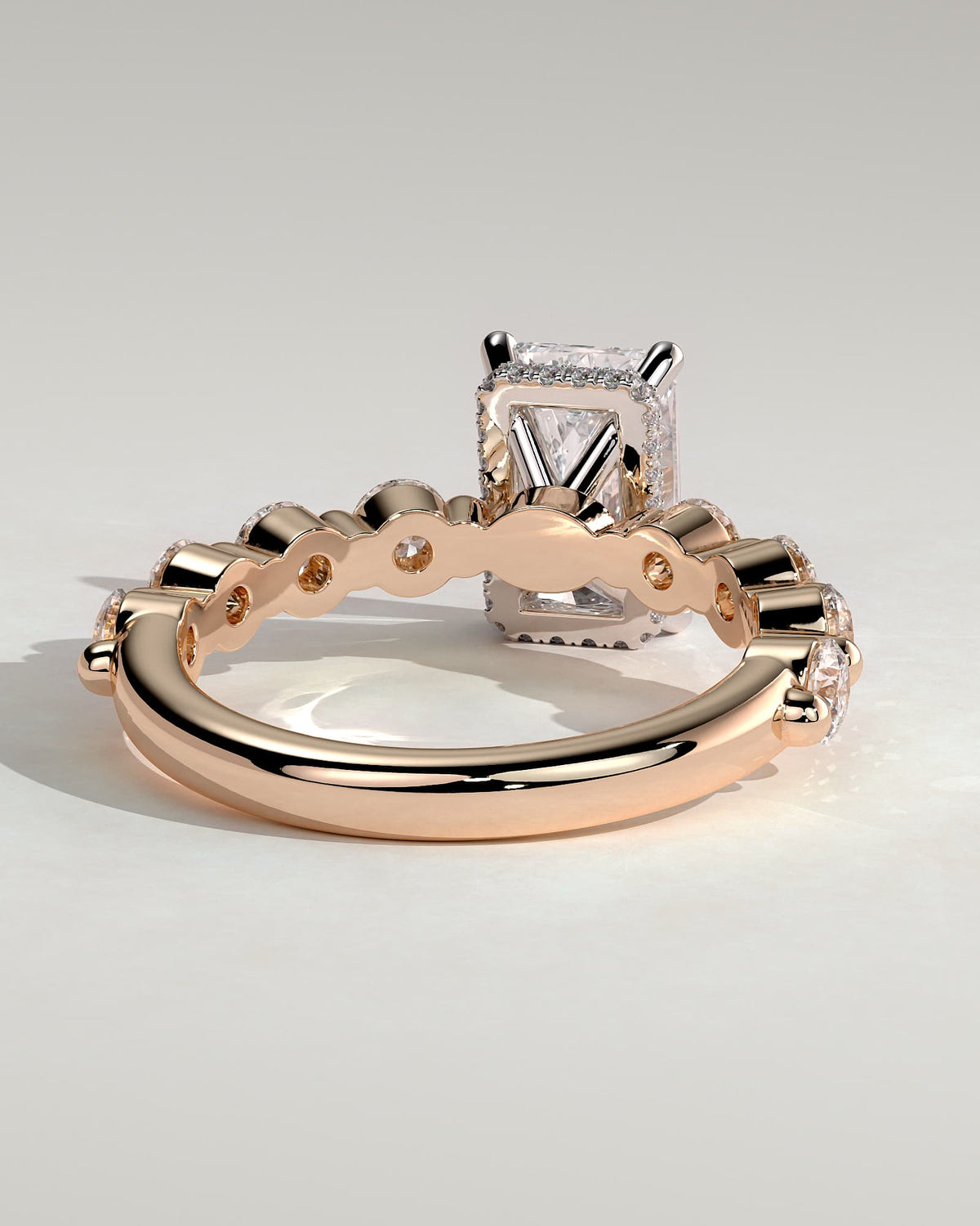 Josephine - Radiant Claw Solitaire with Round Accent Stones and Wrap Around Hidden Halo Engagement Ring - Rose Two-Tone