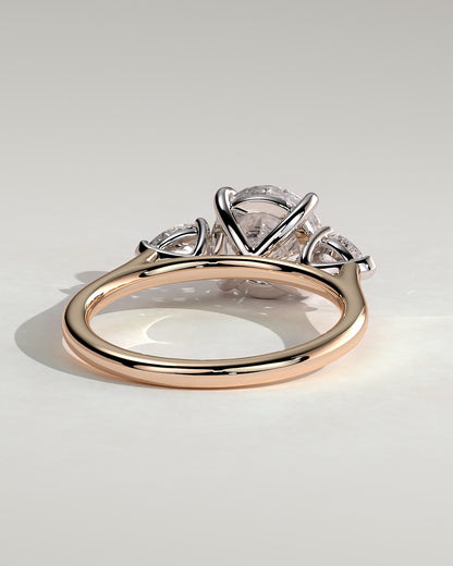 Arya - Round Claw Trilogy with Pear Side Stones and Cathedral Setting Engagement Ring - Rose Two-Tone