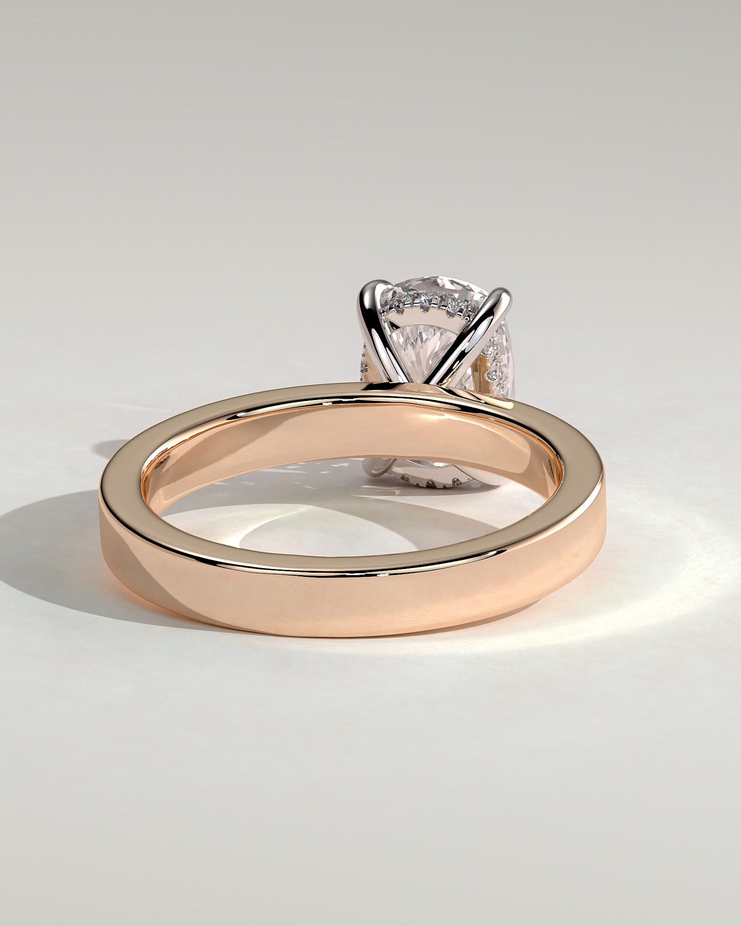 Kai - Elongated Cushion Claw Solitaire with Flat Cigar Band and Hidden Halo Engagement Ring - Rose Two-Tone