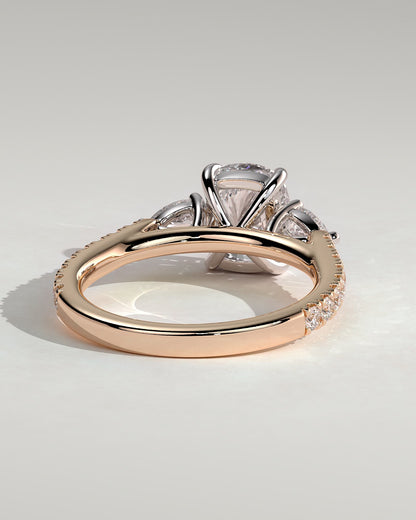 Bree - Elongated Cushion Claw Trilogy with Pear Side Stones and Pave Band Engagement Ring - Rose Two-Tone