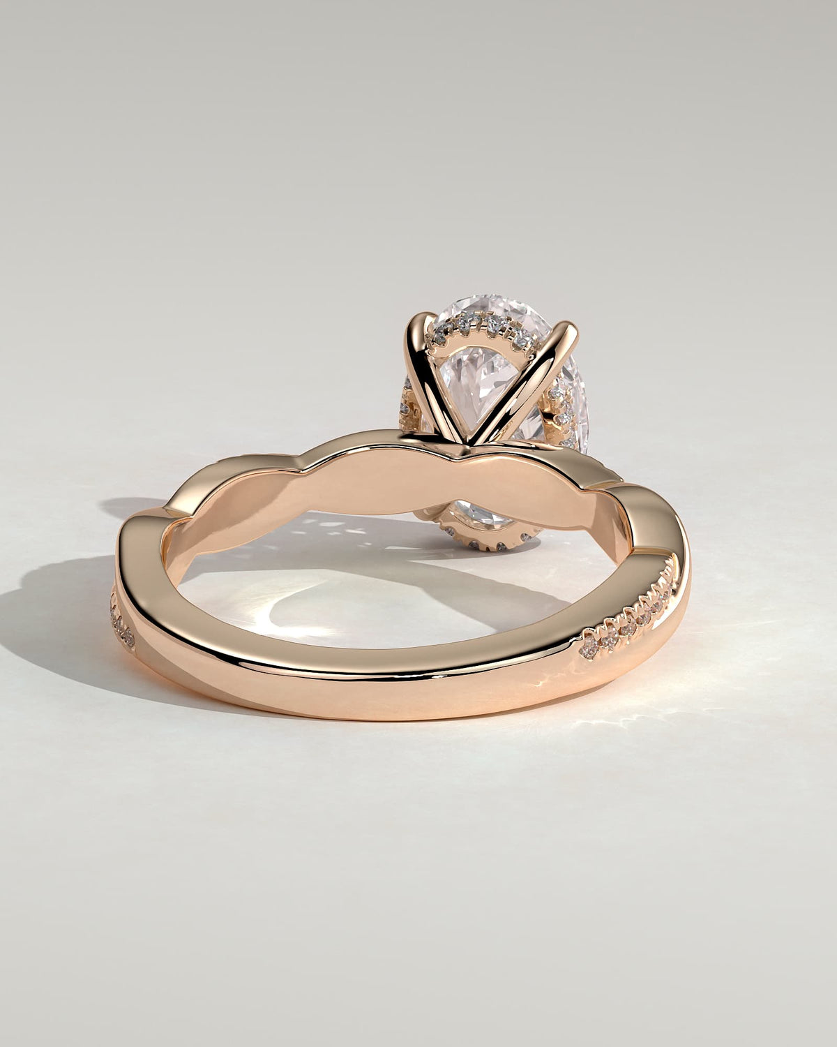 Lara - Oval Claw Solitaire with Hidden Halo and Twisted Alternating Pave Band Engagement Ring - Rose Gold