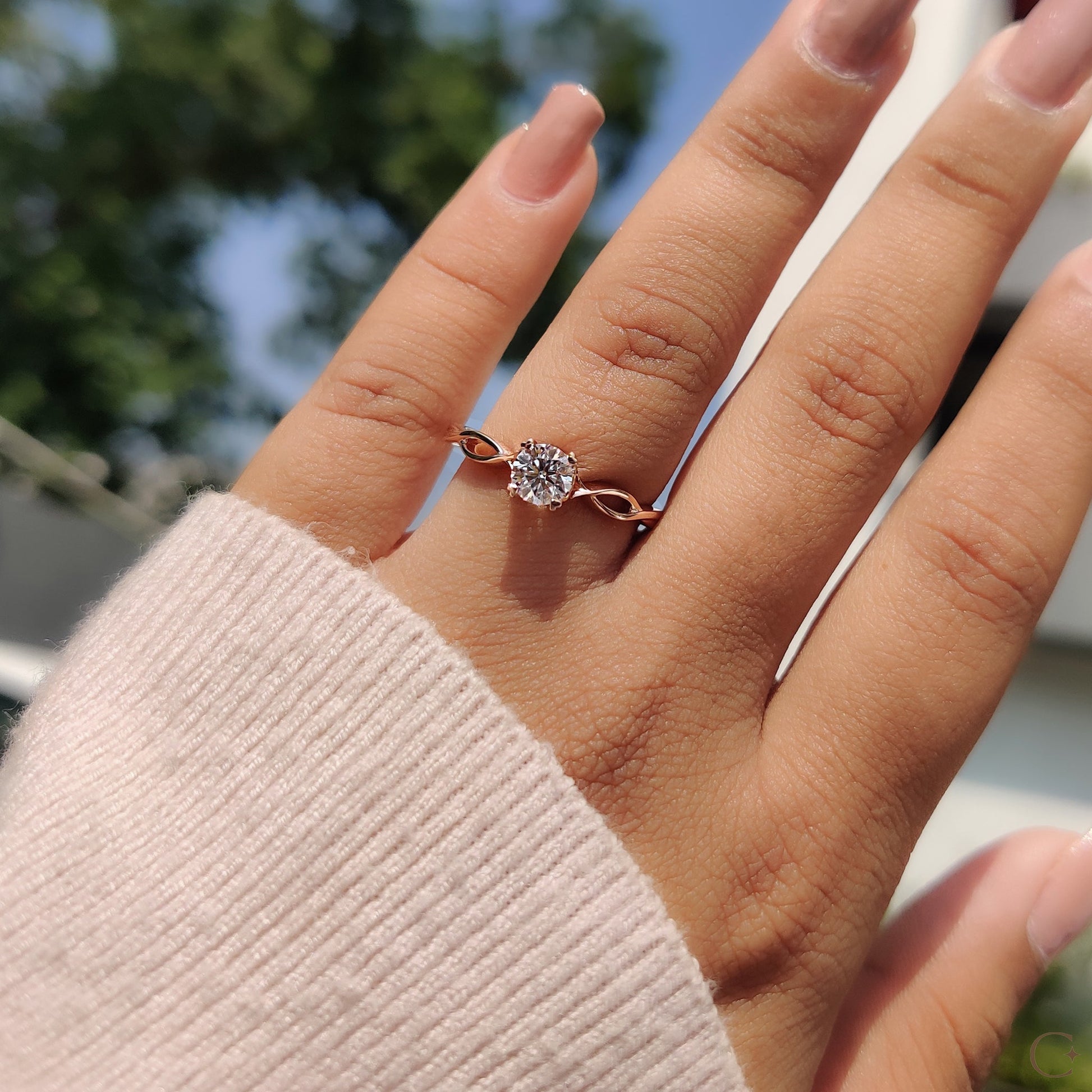 Round Solitaire Engagement Ring With Twisted Shank Band