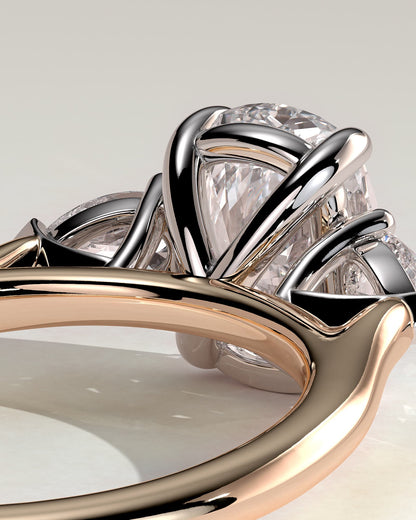 Cataleya - Elongated Cushion Claw Trilogy with Pear Side Stones and Cathedral Setting Engagement Ring - Rose Two-Tone