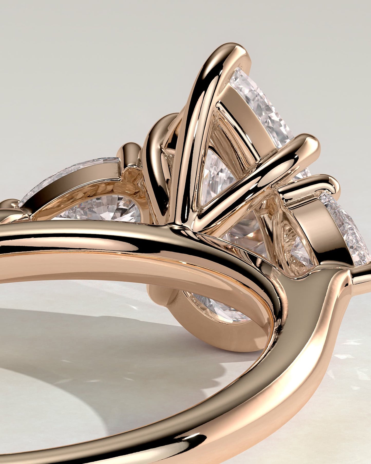 Rosalia - Pear Claw Trilogy with Pear Side Stones and Floating Cathedral High Setting Engagement Ring - Rose Gold
