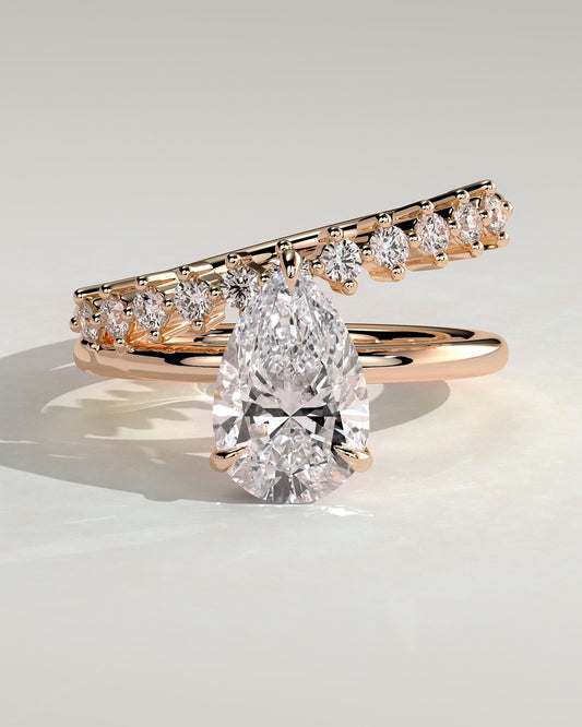 Xanthe - Pear Claw Solitaire with Double Plain-and-Round-Accent Stones Band Engagement Ring - Rose Gold