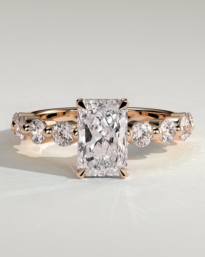 Josephine - Radiant Claw Solitaire with Round Accent Stones and Wrap Around Hidden Halo Engagement Ring - Rose Gold