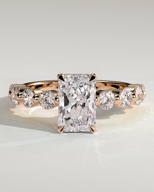 Josephine - Radiant Claw Solitaire with Round Accent Stones and Wrap Around Hidden Halo Engagement Ring - Rose Gold