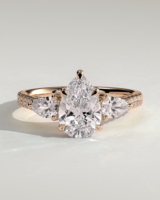 Mia - Pear Claw Trilogy with Pear Side Stones, Pave Band and Cathedral High Setting Engagement Ring - Rose Gold
