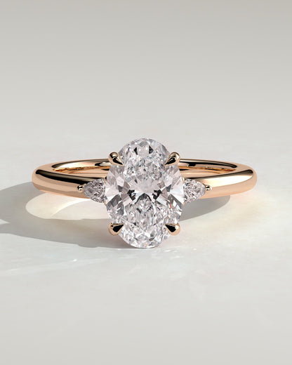 Elena - Oval Claw Trilogy with Pear Side Stones and Tulip Detail Engagement Ring - Rose Gold