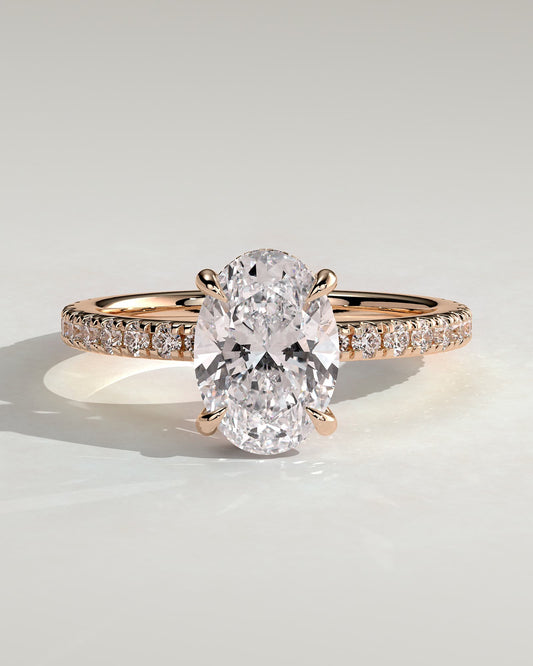 Evangeline - Oval Claw Solitaire with Wrap Around Hidden Halo and Pave Band Engagement Ring - Rose Gold