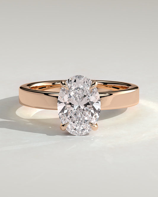 Nikita - Oval Claw Solitaire with Flat Cigar Band and Hidden Halo Engagement Ring - Rose Gold