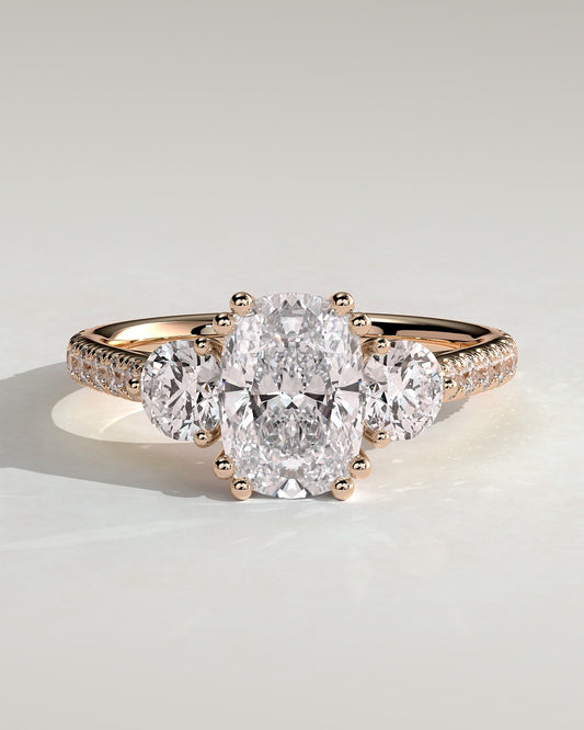Meghan - Elongated Cushion Double Claw Trilogy with Round Side Stones, Pave Band and Cathedral Setting Engagement Ring - Rose Gold