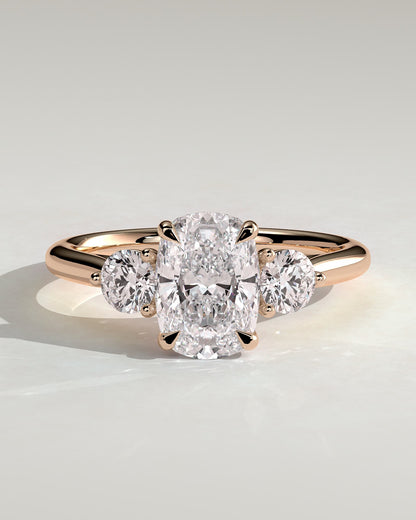 Charmaine - Elongated Cushion Claw Trilogy with Round Side Stones and Lily Detail Engagement Ring - Rose Gold