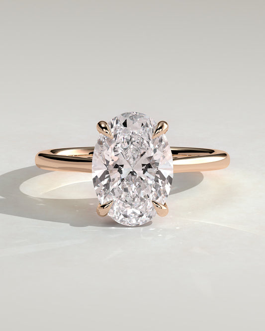 Bethany - Oval Claw Solitaire with Hidden Halo, Tapered Band and Cathedral High Setting Engagement Ring - Rose Gold